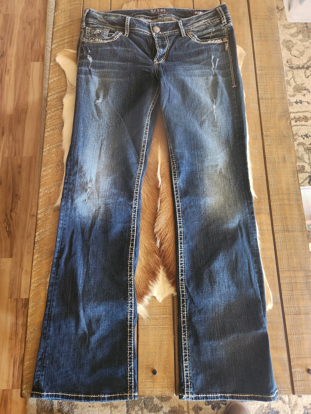 Silver Jeans Dark Blue Flare Jeans with Faded Distress